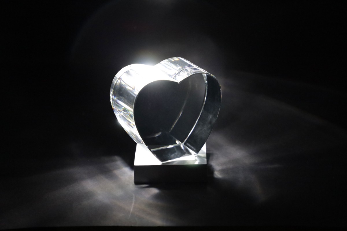 3D, heart shaped laser engraved glass cremation memorial.