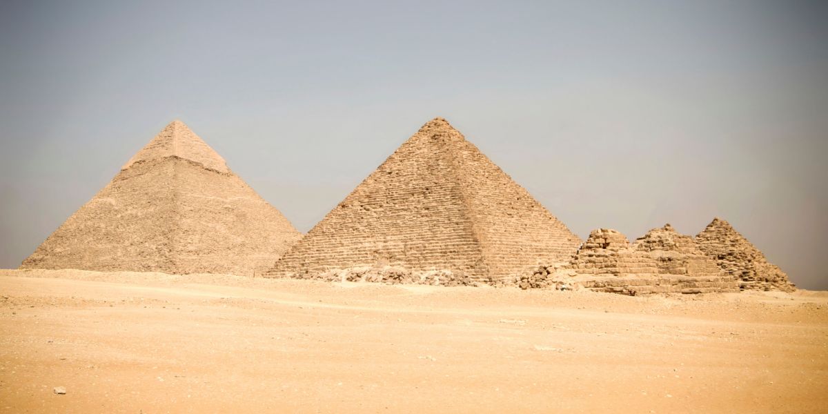 Ancient Egyptian pyramids in the desert.