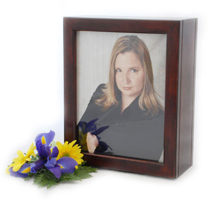 Wooden photo urn with image of a woman.
