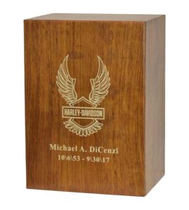 Custom wooden cremation urn featuring Harley Davidson logo.