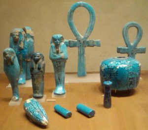 Green ancient Egyptian burial artifacts.