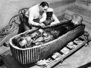 Howard Carter opening King Tutankhamun's tomb