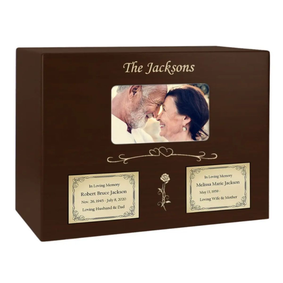 The Espresso Wood Companion Photo Urn is a handmade wood urn for two people. From the top this urn offers a one line sentiment up to 30 characters. Your full color image is next, along with a heart and rose accents in gold or silver.