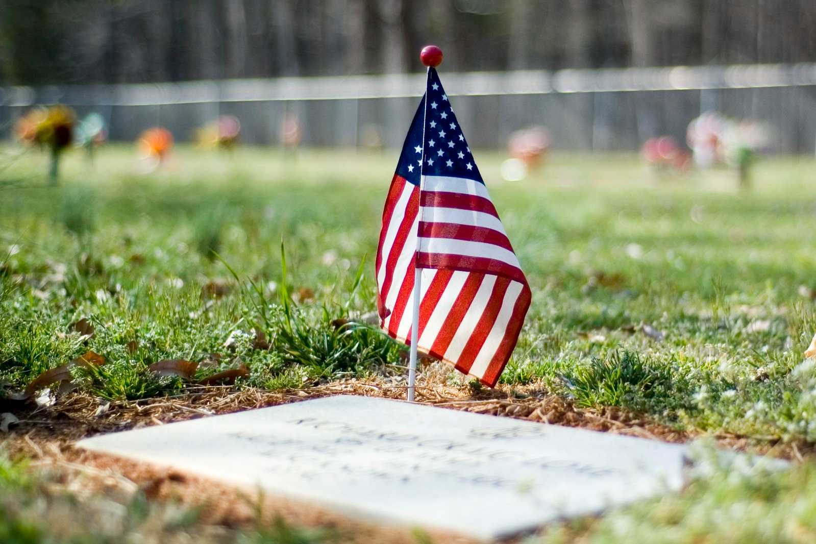 American Flag over grave.