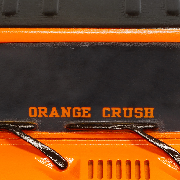 The windshield of the 3D-printed Jeep custom cremation urn has a decal reading "Orange Crush."