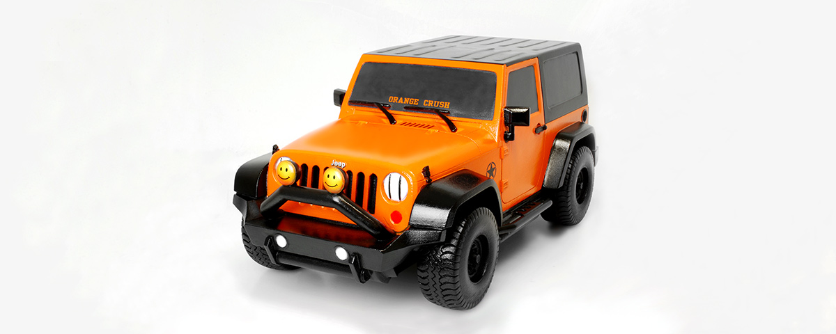 A 3D-printed custom cremation urn resembling a bright orange Jeep.