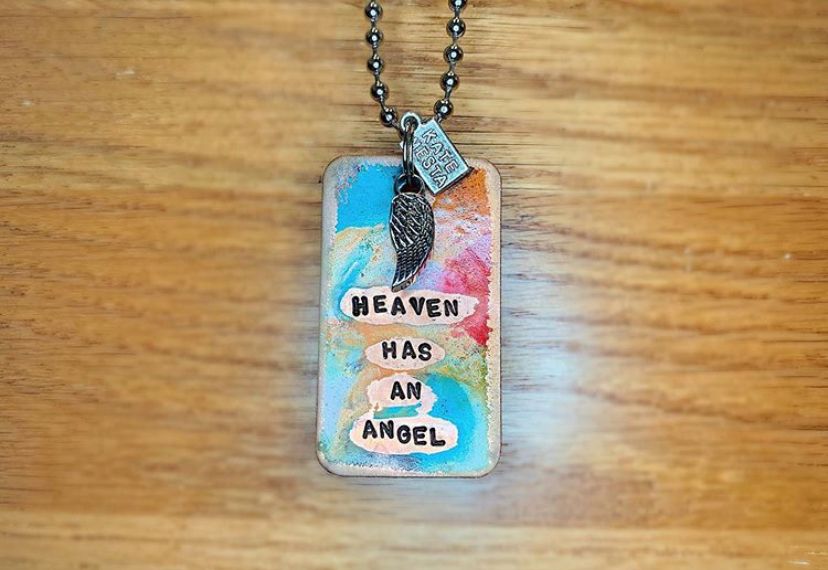 Heaven has an angel dog tag cremation pendant.
