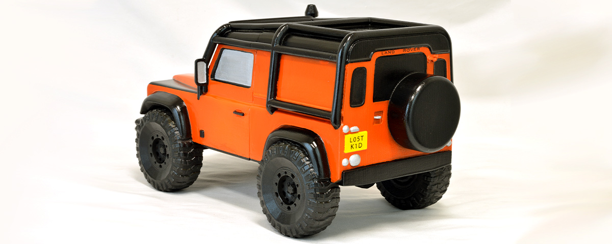 A 3/4ths view of the back of the 3D-printed Land Rover custom cremation urn.