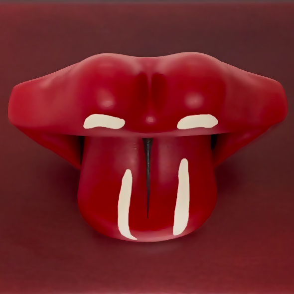 A top-down view of the 3D-printed tongue and lips on top of a wooden urn.