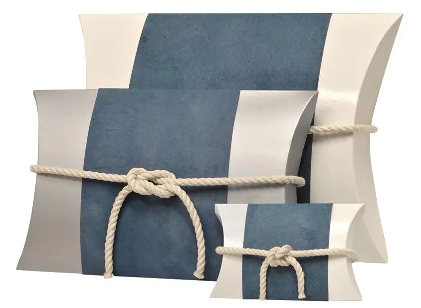 The Peaceful Pillow® Fishermen Water Burial Urns are 100% biodegradable and ideal for water or land burials. This urn is accented with sea blue paper on a white or silver urn with a nautical rope tie.