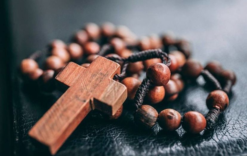 Wooden rosary necklace.